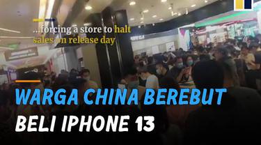 Beredar video warga China berdesak-desakan berebut beli Iphone 13 di sebuah mal di Provinsi Shaanxi, China.