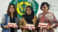 Srikandi Indonesia yang meraih medali perak Olimpiade 1988 Seoul, Lilis Handayani, Kusuma Wardhani, dan Nurfitriyana Saiman. (Bola.com/Dok.Istimewa)