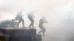Prajurit Marinir lompat dari tank untuk membuat formasi upacara HUT Korps Marinir ke-72 di Kesatrian Marinir Hartono, Cilandak, Jakarta, Rabu (15/11). HUT Marinir ke-72 bertema Marinir Prajurit Pejuang dan Profesional. (Liputan6.com/Helmi Fithriansyah)