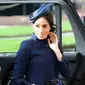 Meghan Markle saat menghadiri pernikahan Putri Eugenie (Foto: Gareth Fuller / POOL / AFP)