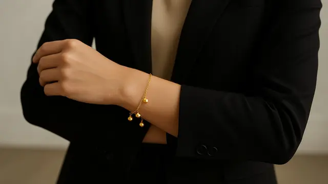 Model Gelang Emas Elegan 2 Gram dengan Bola Kecil Tren 2025/ Ilustrasi oleh AI