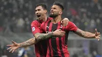 AC Milan berhasil mengalahkan Inter Milan 2-1 dalam Derby della Madonnina di Liga Italia, Sabtu (5/2/2022). Sempat tertinggal 0-1, AC Milan comeback dan memukul balik Inter 2-1 melalui dua gol Olivier Giroud yang menjalani debutnya di derby kota Milan tersebut. (AP/Antonio Calanni)