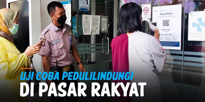 VIDEO: Uji Coba Penerapan Aplikasi Pedulilindungi di Pasar Rakyat, Ini Tanggapan Pedagang