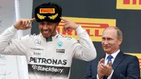 Pebalap Mercedes, Lewis Hamilton, menjadi kampiun GP Rusia setelah finis tercepat pada balapan di Sirkuit Sochi, Minggu (11/10/2015)