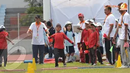 Banyak jenis olahraga atletik yang dapat dilakukan. Tampak salah satu peserta sedang melakukan lempar lembing (Liputan6.com/Helmi Fithriansyah)
