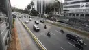 Kendaraan melintas di kawasan Sudirman, Jakarta, Sabtu (11/8). Menjelang Asian Games 2018, pedestrian di kawasan Sudirman sudah dapat dinikmati masyarakat. (Liputan6.com/Herman Zakharia)