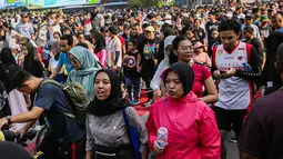 Car Free Day (CFD) hari ini penuh sesak dengan banyaknya warga yang datang. (Liputan6.com/Angga Yuniar)