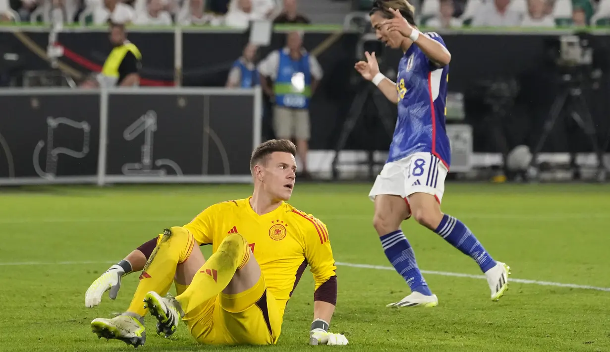 Jerman yang bermain di rumah sendiri babak belur dihajar Jepang 1-4. (AP Photo/Martin Meissner)