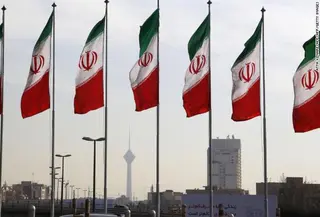 Bendera Iran (Atta Kenare / AFP PHOTO)