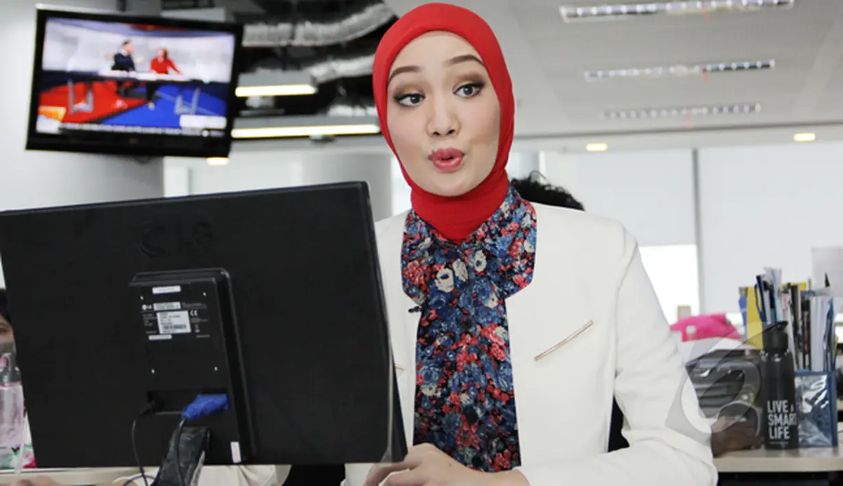 Kini, Vina melanjutkan karirnya sebagai presenter di Liputan6.com namun tetap masih aktif menjadi None Jakarta 2014, Jakarta, Selasa (3/3/2015). (Liputan6.com/Helmi Afandi)