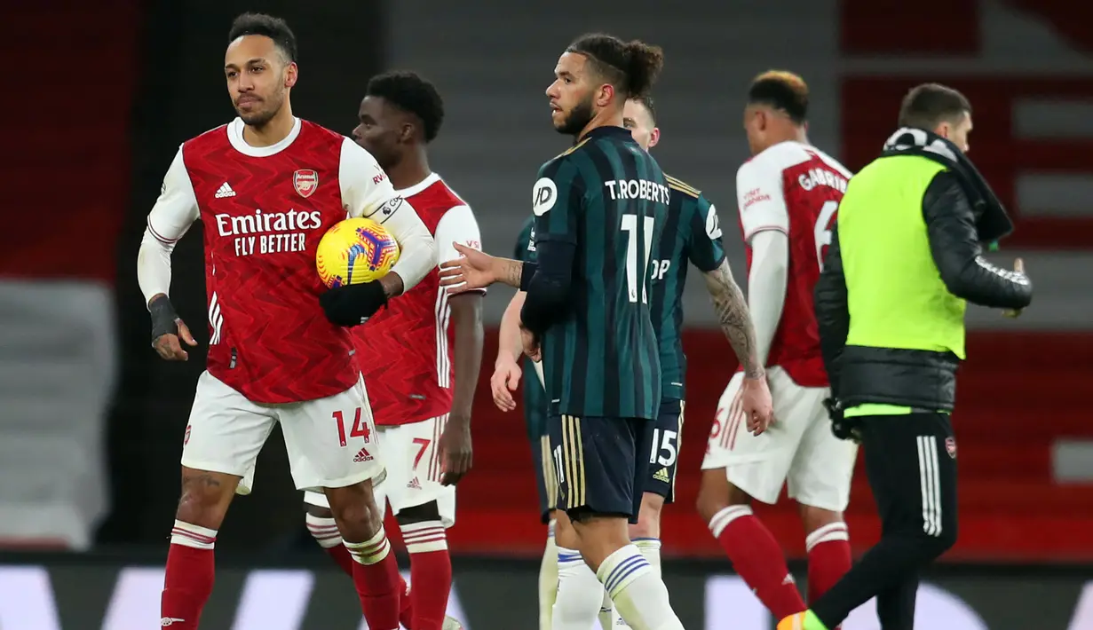 Pierre-Emerick Aubameyang tercatat pernah membela Arsenal selama 5 musim mulai tengah musim 2017/2018 hingga tengah musim 2021/2022. Total tampil dalam 128 laga di Premier League bersama The Gunners, ia mampu mencetak 68 gol dan 16 assist, termasuk satu kali hattrick. Hattrick tersebut dibuat ke gawang Leeds United pada pekan ke-24 musim 2020/2021 (14/2/2021) dalam laga yang berakhir 4-2. (AFP/Pool/Catherine Ivill)
