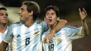 Gelar juara pertama Lionel Messi bersama Timnas Argentina adalah Piala Dunia U-20. Ia berhasil membuktikan kualitasnya dengan mencetak enam gol pada turnamen yang berlangsung di Belanda pada tahun 2005 tersebut. Pada partai final melawan Nigeria, Argentina menang 2-1. Gol kemenangan Argentina dicetak La Pulga pada menit 40' dan 75' lewat titik putih. Atas penampilan gemilanya, ia dianugerahi penghargaan Golden Ball. (AFP/Luis Acosta)