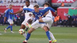 Lorenzo Pellegrini membuka kemenangan Italia lewat golnya di menit ke-3. (Charly TRIBALLEAU/AFP)
