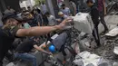 Perang ini telah menyebabkan lebih dari 1.400 orang di Israel tewas, serta lebih dari 4.100 warga Palestina, menurut Kementerian Kesehatan Gaza yang dikelola Hamas. (AP Photo/Fatima Shbair)