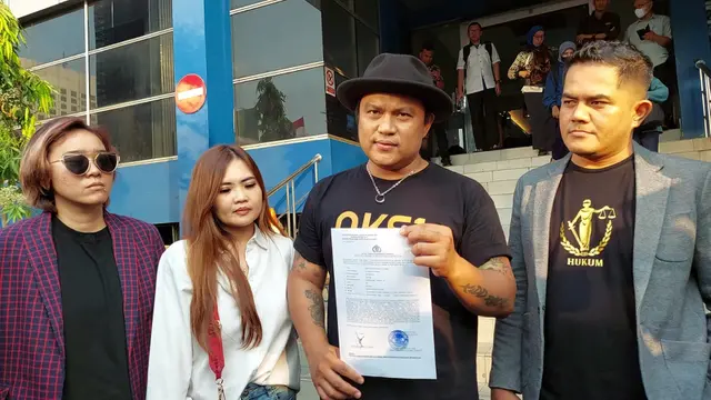 Posan Tobing melaporkan personel Grup Band Kotak atas dugaan pelanggaran hak cipta.