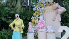 Syahrini Tampil Colorful di Ultah Kedua Baby R, Tenteng Tas Hermes Unik Seharga Rp104 Jutaan