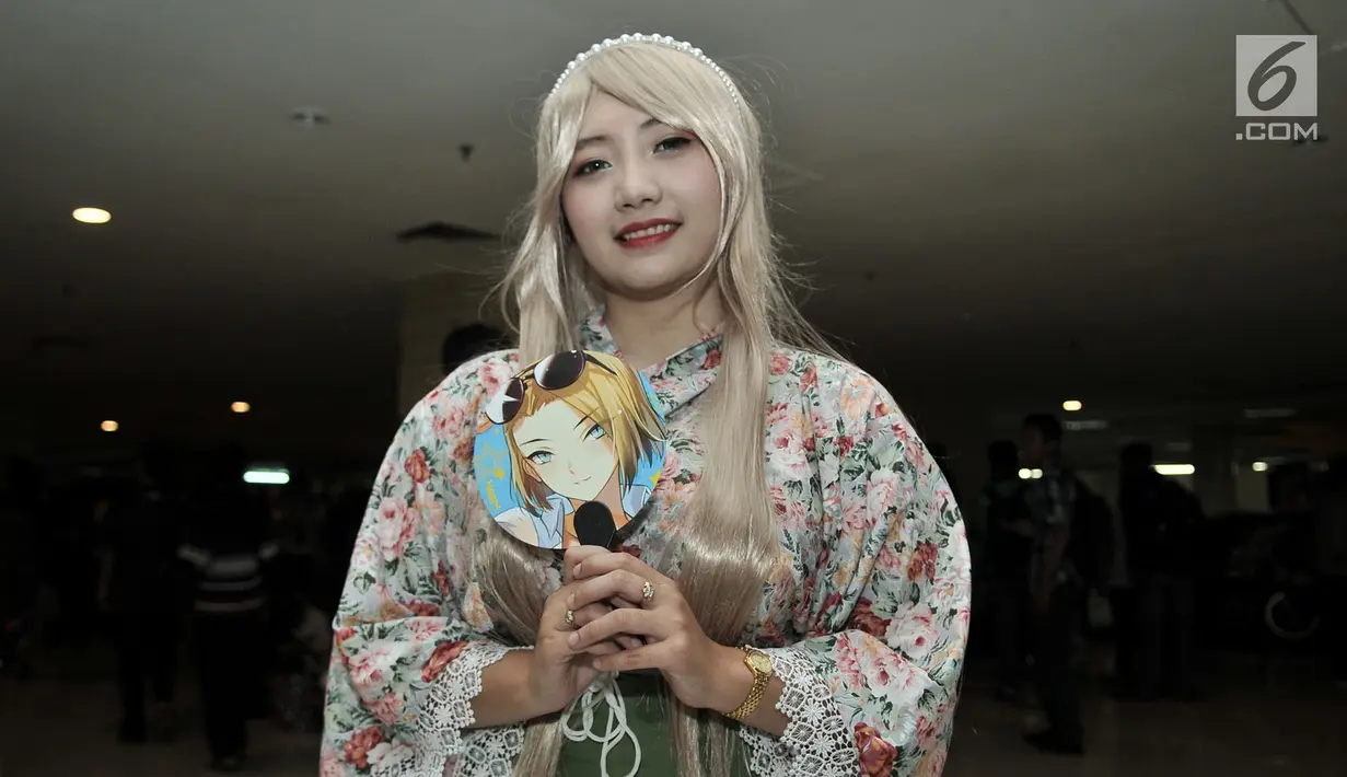 Cosplay berpose di Festival Ennichisai, Jakarta, Minggu (1/7). Festival ini dimeriahkan oleh para penggemar berkostum ala film animasi, komik, hingga karakter video game atau yang lebih dikenal dengan istilah Cosplay. (Merdeka.com/Iqbal S. Nugroho)