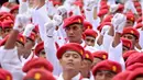 Kepalan tangan tanda kesatuan tekad untuk memperjuangkan kemenangan Partai Gerindra dalam Pemilu 2014 diperlihatkan para anggota Garuda (Liputan6.com/Helmi Fithriansyah)