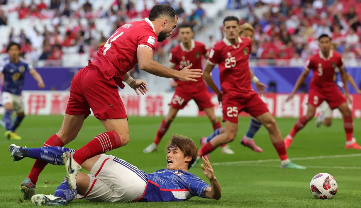 Hasil laga ini menempatkan Jepang sebagai runner up Grup D dan memastikan lolos ke babak 16 besar Piala Asia 2023 . (Giuseppe CACACE/AFP)