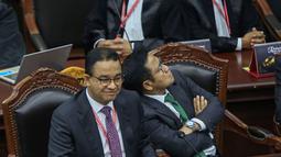 Dalam putusannya, MK menyebutkan bahwa tak terbukti adanya intervensi Presiden terkait penetapan capres-cawapres 2024 seperti yang dituduhkan kubu AMIN. (Liputan6.com/Angga Yuniar)