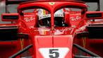 Pembalap Ferrari, Sebastian Vettel melaju pada hari ketiga tes pramusim Formula 1 (F1) di Sirkuit Catalunya, Barcelona, Kamis (8/3). Catatan waktu pebalap Ferrari itu juga memecahkan rekor sebelumnya. (AP/Manu Fernandez)