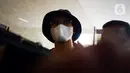 Indra Kesuma alias Indra Kenz tiba di Gedung Bareskrim, Jakarta, Kamis (24/2/2022). Indra Kenz menjalani pemeriksaan terkait kasus dugaan penipuan investasi bodong aplikasi trading binary option Binomo. (merdeka.com/Imam Buhori)