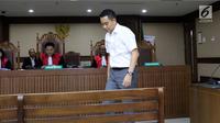 Terdakwa dugaan suap proyek Bakamla, Fayakhun Andriadi usai menjalani sidang lanjutan di Pengadilan Tipikor, Jakarta, Rabu (19/9). Sidang mendengar keterangan saksi Irvanto Hendra Pambudi, (Liputan6.com/Helmi Fithriansyah)