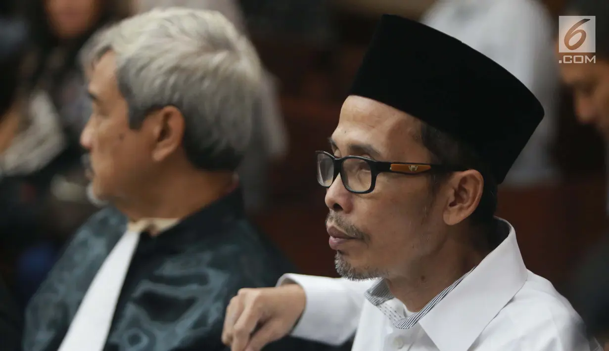 Kakanwil Kemenag Gresik yang juga tersangka pemberian suap kepada anggota DPR Romahurmuziy, Muafaq Wirahadi jelang sidang pembacaan dakwaan di Pengadilan Tipikor, Jakarta, Rabu (29/5/2019). Muafaq Wirahadi didakwa memberi suap mantan Ketua Umum PPP Romahurmuziy. (Liputan6.com/Helmi Fithriansyah)