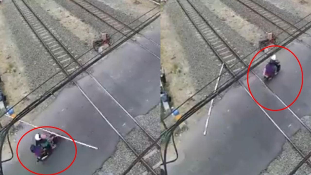 Terobos Palang Perlintasan Kereta Api hingga Copot, Emak-Emak Bermotor Ini Tak Peduli