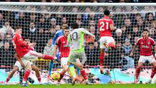 Pemain Manchester City, Rayan Cherki, mencetak gol ke gawang Nottingham Forest pada laga pekan ke-18 Premier League di Stadion The City Ground, Sabtu (27/12/2025). (Joe Giddens/PA via AP)