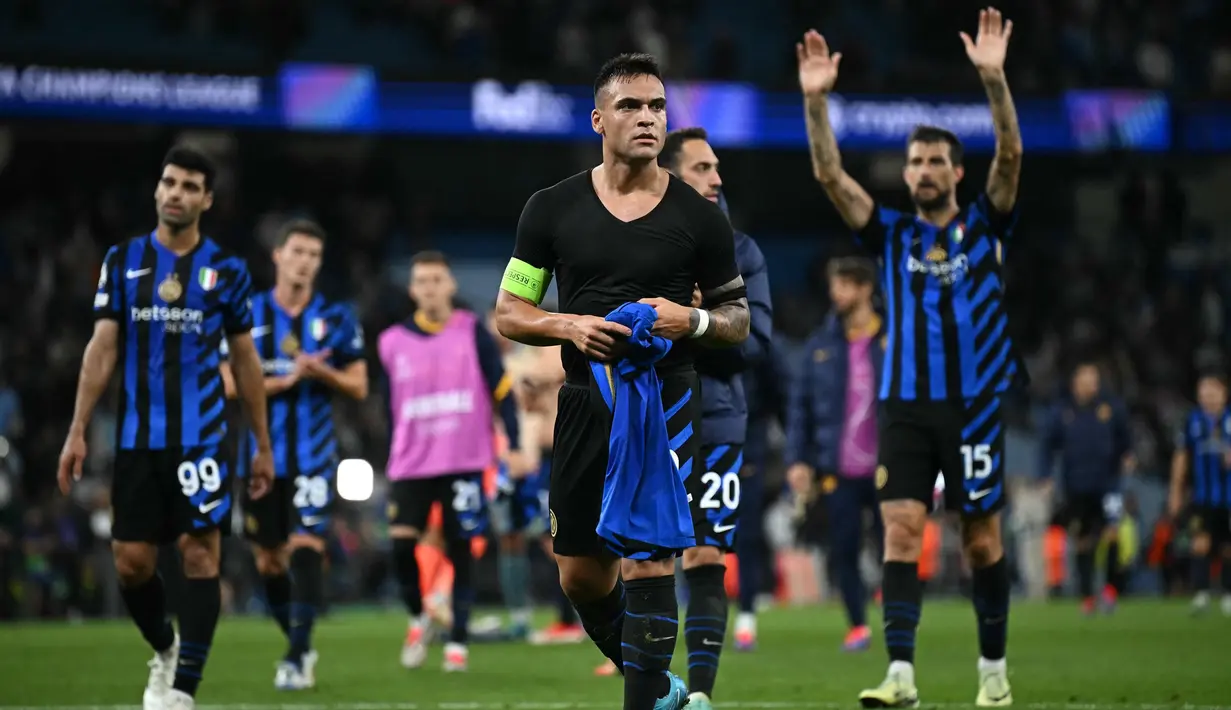 Manchester City dan Inter Milan harus berbagi satu poin dan menempati papan tengah di klasemen sementara League Phase Liga Champions 2024/2025. (Paul ELLIS/AFP)