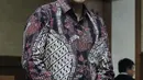 Dudy Jocom usai menjalani sidang dakwaan di Pengadilan Tipikor, Jakarta, Rabu (11/7). Dudy didakwa pada kasus dugaan korupsi pengadaan dan pelaksanaan pembangunan kampus IPDN Provinsi Sumatera Barat di Kab Agam TA 2011,. (Liputan6.com/Helmi Fithriansyah)