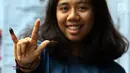 Warga menunjukkan jari bertinta usai menggunakan hak pilih pada Pemilu 2019 di Jakarta, Rabu (17/4). Pemungutan suara Pemilu 2019 digelar di lebih dari 800 ribu TPS. (Liputan6.com/JohanTallo)