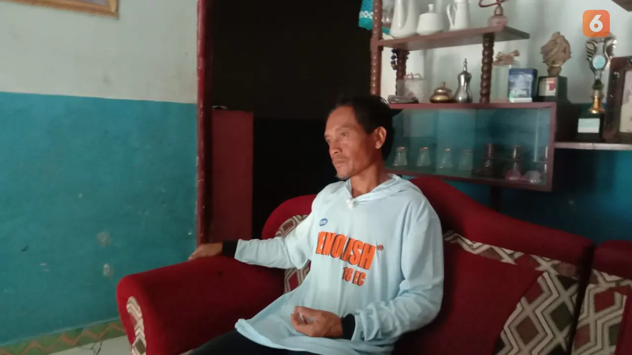 Sugimin suami LW pekerja migran Indonesia asal Banyuwangi. (Hermawan Arifianto/Liputan6.com)