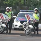 Sejumlah anggota kepolisian saat mengikuti Apel  "operasi patuh jaya 2015" di lapangan dit lantas Polda metro jaya, Jakarta, Rabu (27/5/2015). Operasi ini merupakan cipta kondisi menjelang bulan ramadan. (Liputan6.com/Herman Zakharia)