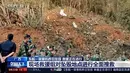 Tentara melakukan operasi pencarian di lokasi kecelakaan pesawat maskapai China Eastern Airline di Tengxian, Daerah Otonomi Guangxi Zhuang, Selasa (22/3/2022). Ada 132 orang di pesawat Boeing 737-800 tersebut, termasuk kru, yang jatuh pada Senin (21/3). (CCTV via AP Video)