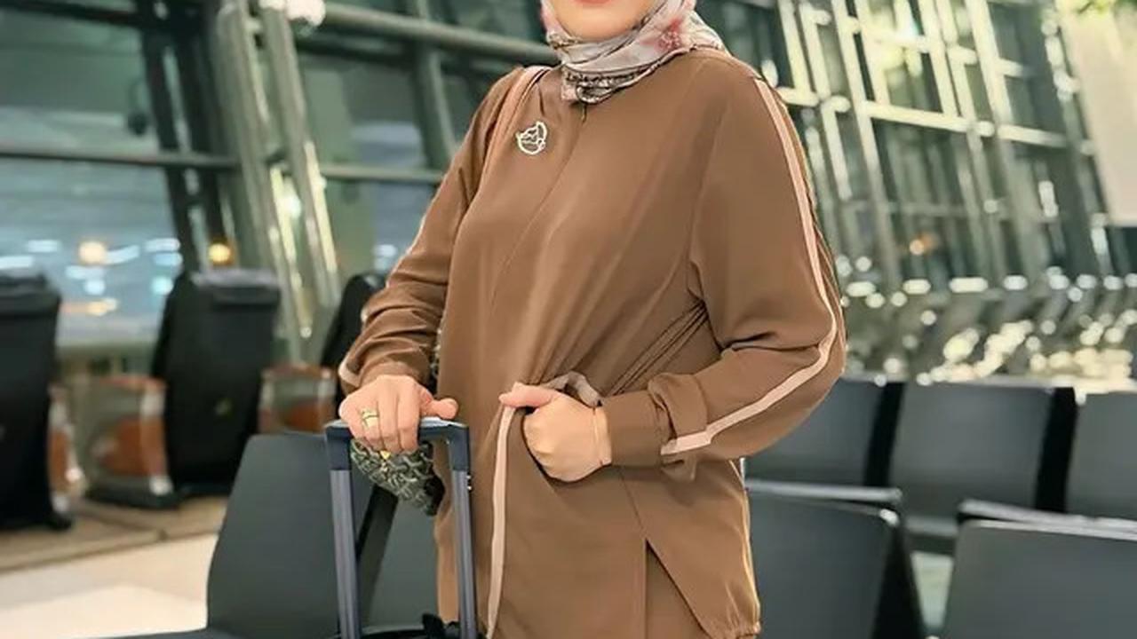 5 Gaya Angelina Sondakh saat di Bandara, Feminin dan Profesional