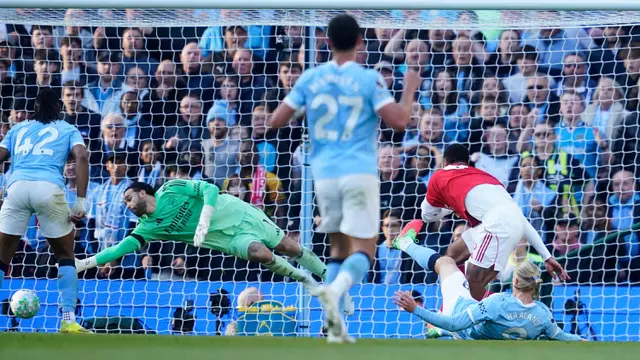 Foto: Aksi Tak Terhentikan Erling Haaland Bawa Man City Tumbangkan Arsenal di Liga Inggris