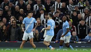 Pemain Manchester City merayakan gol yang dicetak Nico O'Reilly ke gawang Newcastle United dalam laga pekan ke-27 Premier League 2025/2026, Minggu (22/2/2026) dini hari WIB. (Darren Staples / AFP)