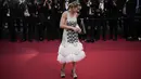 <p>Brie Larson berpose untuk fotografer setibanya di pemutaran perdana film 'Asteroid City' di Festival Film Cannes 2023, Cannes, Prancis selatan, Selasa, 23 Mei 2023. (AP Photo/Daniel Cole)</p>