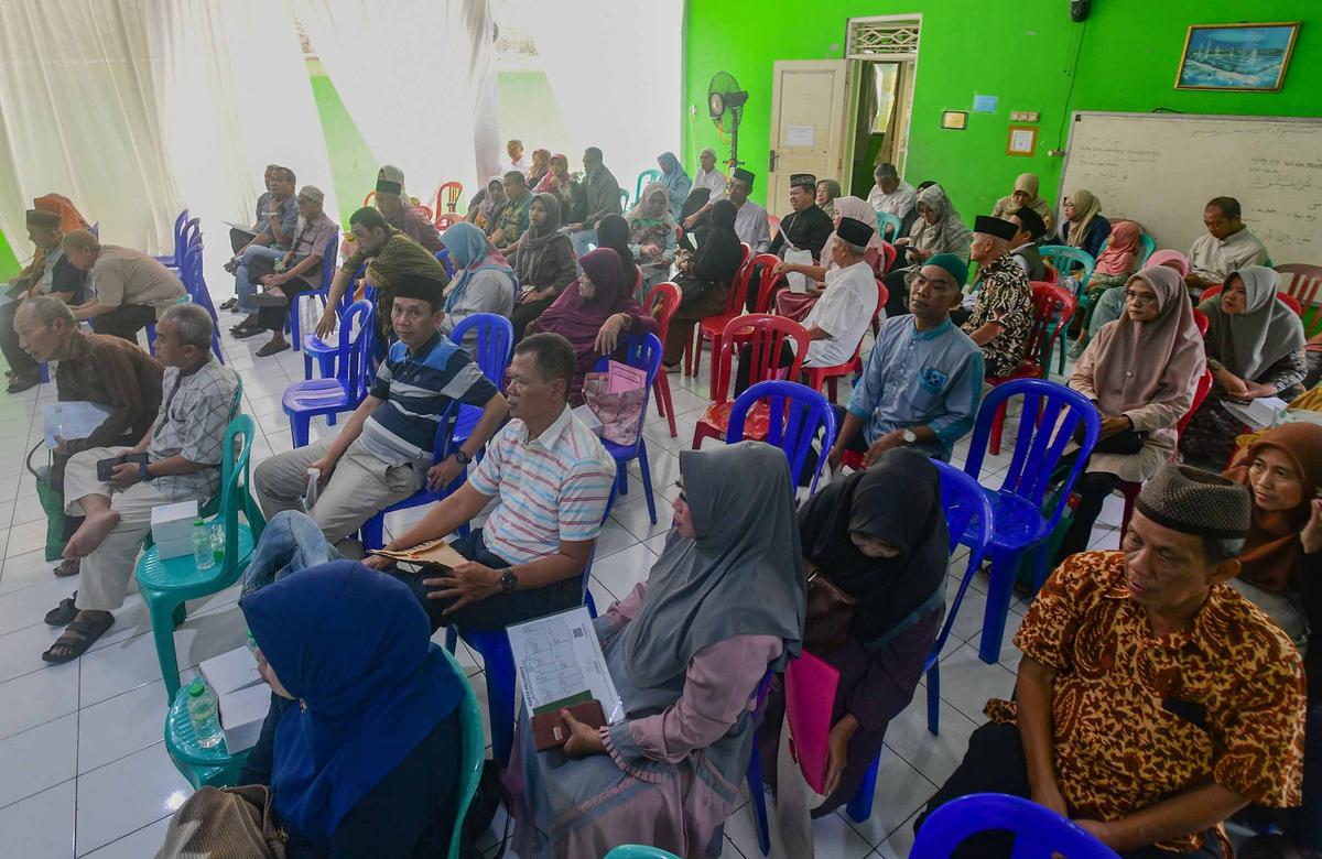 FOTO: Antusias Warga Serbu Layanan Paspor Haji Jemput Bola di Pamulang