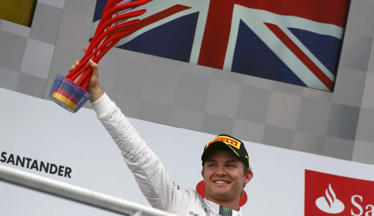 Pembalap F1 dari tim Mercedes, Nico Rosberg, sukses menempati podium utama GP Jerman di Sirkuit Hockenheim, (20/7/2014). (REUTERS/Michael Dalder)