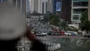 Kemacetan terjadi di kawasan jalan MH Thamrin, Jakarta, Kamis (14/5/2015). Warga Jakarta dan sekitarnya memanfaatkan liburan panjang akhir pekan dengan memadati pusat-pusat perbelanjaan. (Liputan6.com/Faizal Fanani)