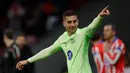 Barcelona sukses menyamakan skor di menit ke-78. Umpan silang Raphinha mampu dikonversi Ferran Torres menjadi gol tanpa bisa diantisipasi penjaga gawang Atletico de Madrid, Jan Oblak. (OSCAR DEL POZO/AFP)