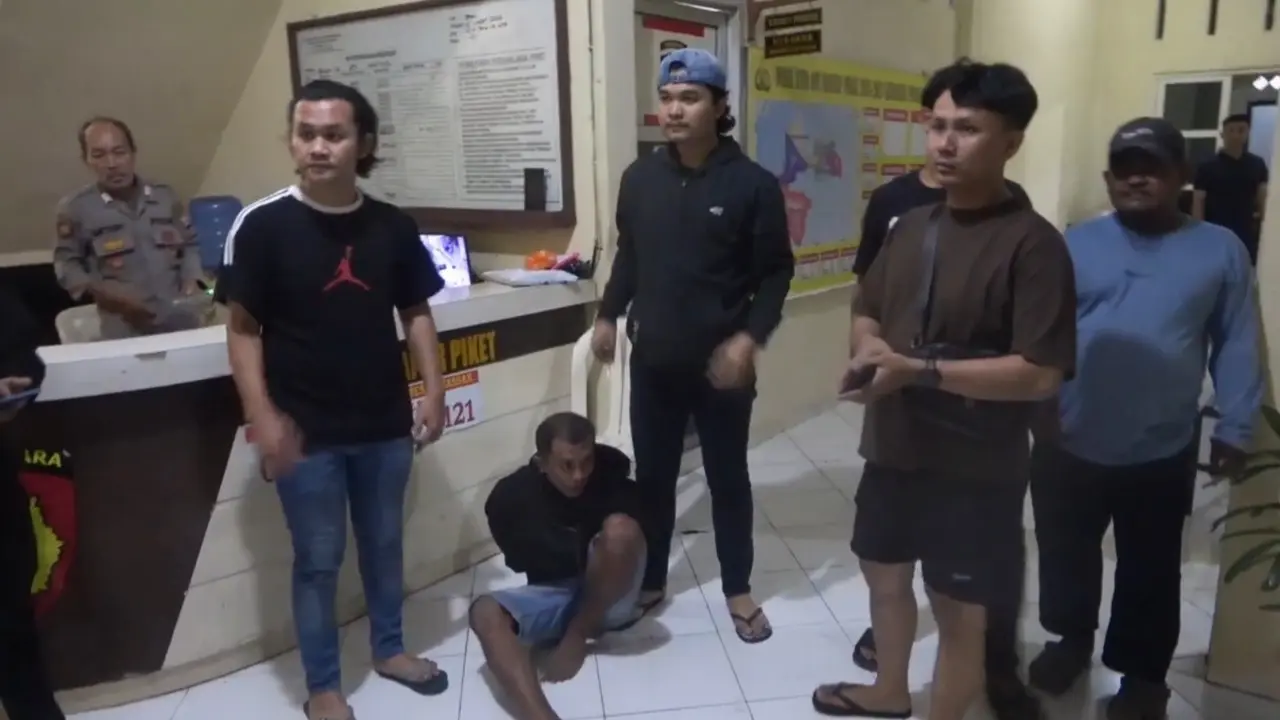 Penyiraman Air Kera