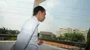 Jokowi saat berada di tower baru Rusun Cipinang Besar Selatan, Jakarta, Kamis (14/8/14). (Liputan6.com/Herman Zakharia) 