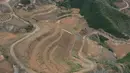 Foto udara menunjukkan ladang untuk penaburan benih usai bekas tambang direstorasi di Kota Maquanzi, Wilayah Otonom Etnis Manchu Qinglong, Provinsi Hebei, China, 5 September 2020. Wilayah tersebut berfokus pada restorasi tambang terbuka dan reklamasi sekitar 584 hektare lahan. (Xinhua/Yang Shiyao)