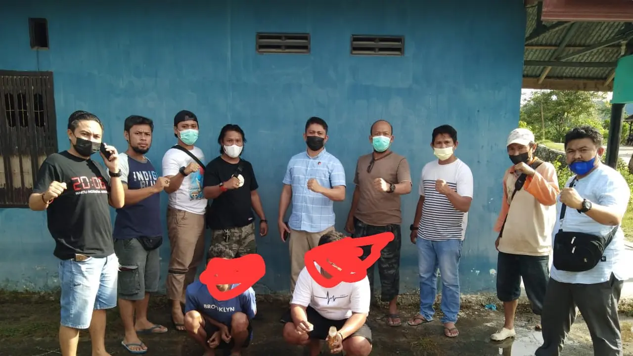 Pelaku pengedar narkoba saat diringkus Polres Bone Bolango (Arfandi Ibrahim/Liputan6.com)