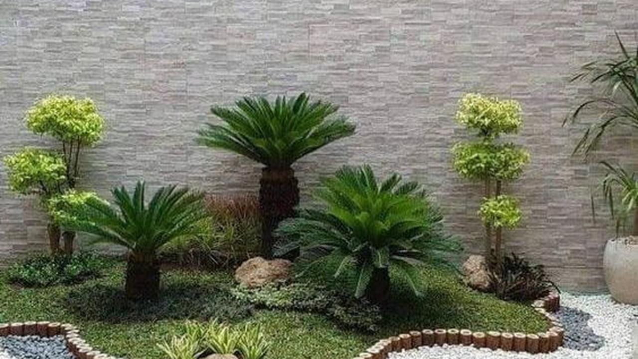 2. Tembok Taman Minimalis Batu Alam Bertekstur