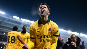 Pemain AC Milan, Christian Pulisic, melakukan selebrasi setelah mencetak gol ke gawang Torino pada laga pekan ke-14 Serie A 2025/2026 di Olimpico Grande Torino pada Selasa (9/12/2025). (AFP/Marco Bertorello)